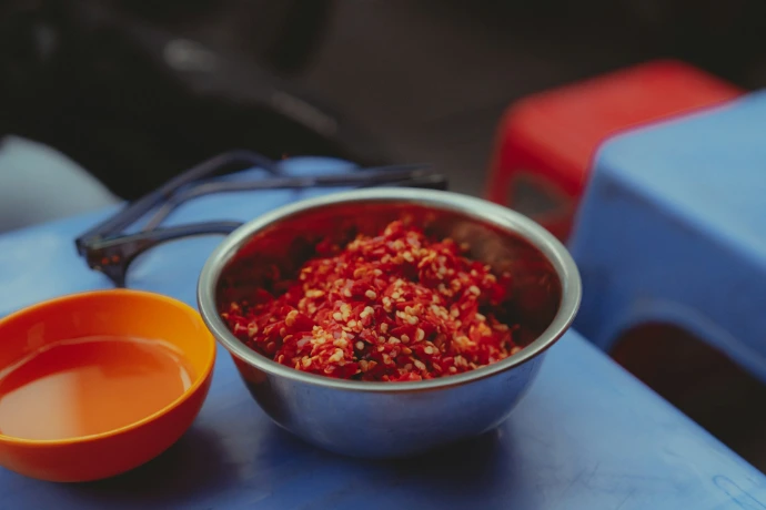 Sambal on top of a blue table